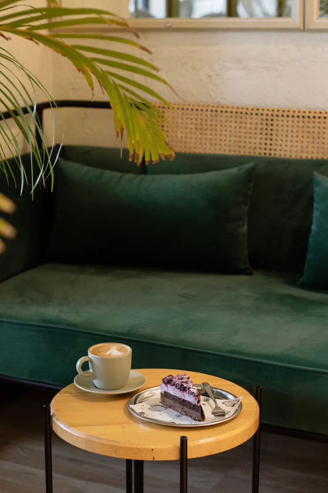 Representative cake and coffee in a café lounge