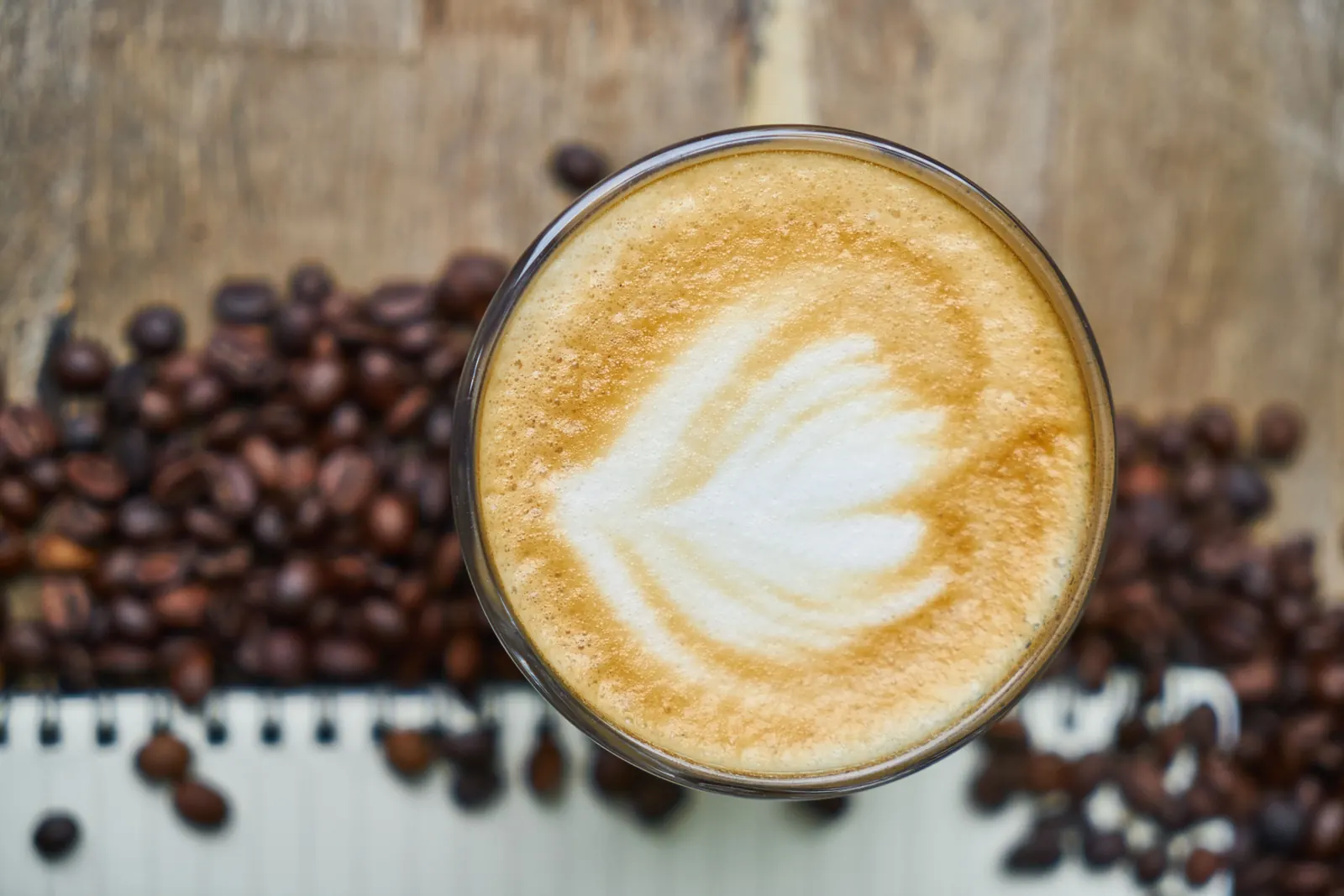 Representative latte with coffee beans
